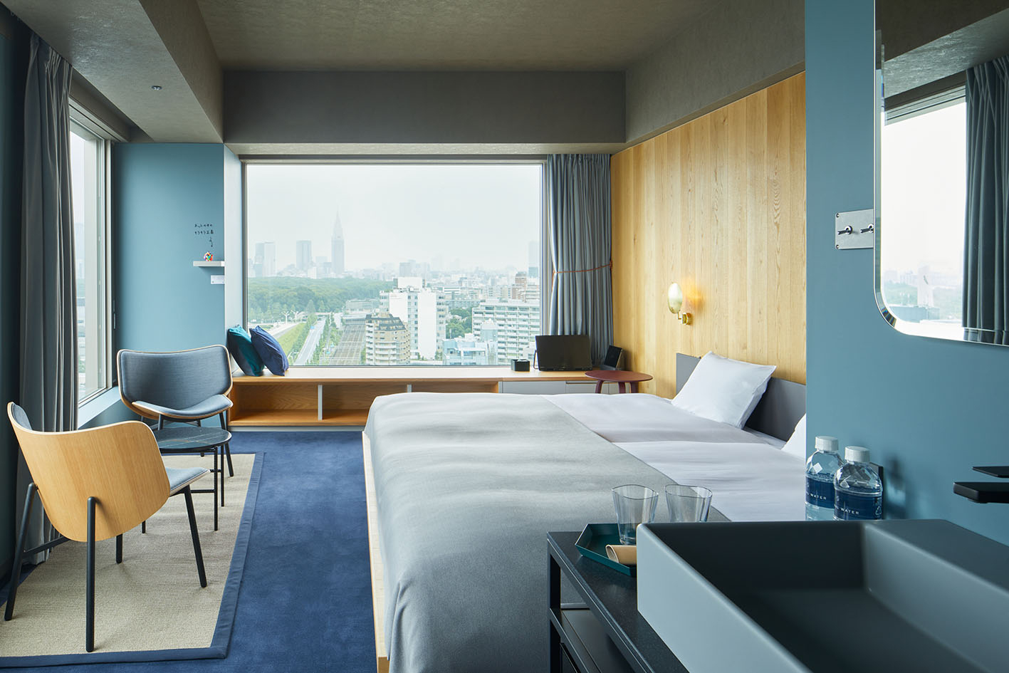 A panoramic view of Shibuya from a stylish room